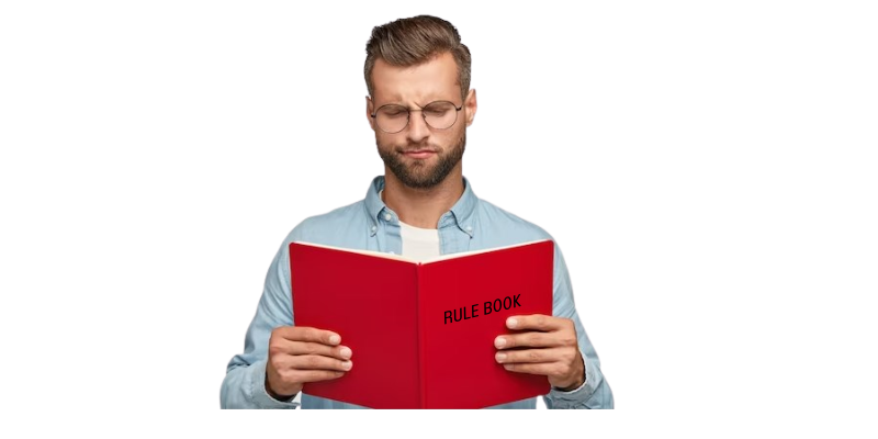 Man reading rule book